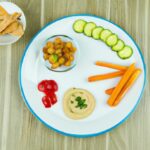 Crunch into Health: Hummus Paired with Colorful Veggie Sticks