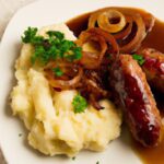 Savoring Bangers and Mash: The Art of Onion Gravy Bliss