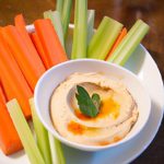 Crunchy Carrot & Celery Sticks Paired with Creamy Hummus
