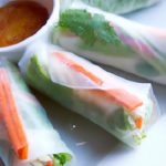 Crisp Vietnamese Spring Rolls Paired with Savory Peanut Sauce